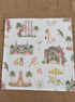 Oyster and Arrow Palm Beach linen napkin with colorful hand-illustrated Worth Avenue Clock Tower, The Breakers, Colony Hotel and Via Parigi motifs