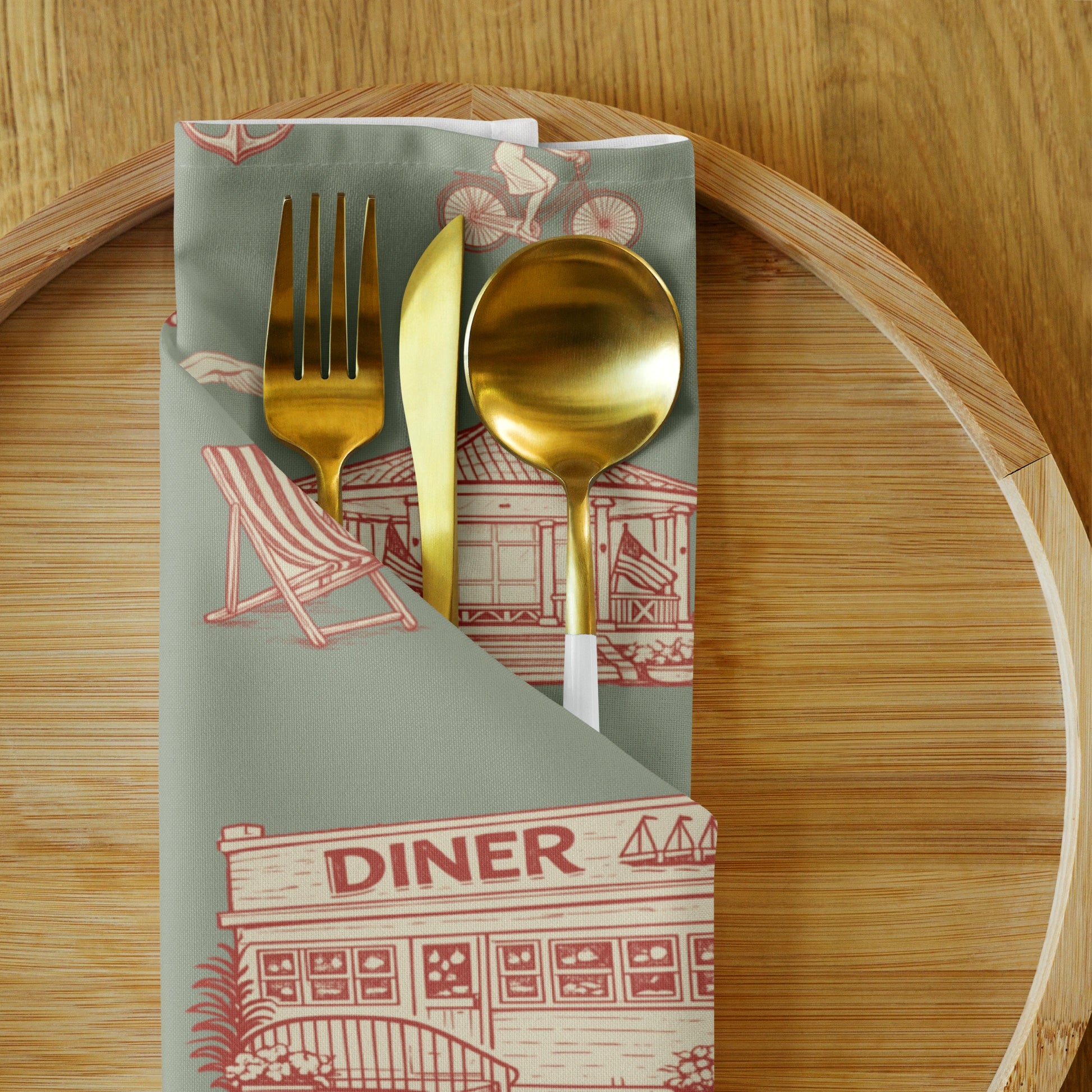 Napkin with fork, knife, and spoon holder on a wooden surface